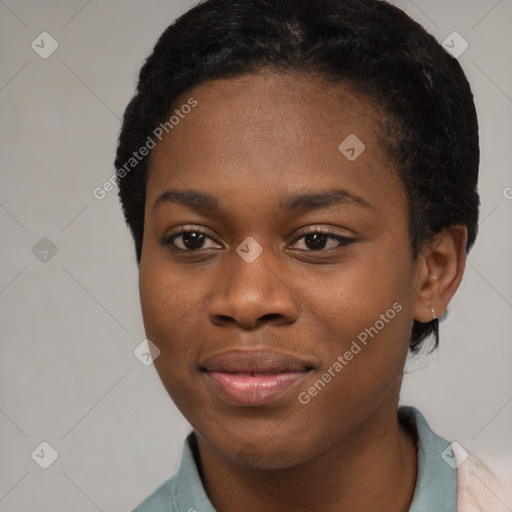 Joyful black young-adult female with short  brown hair and brown eyes