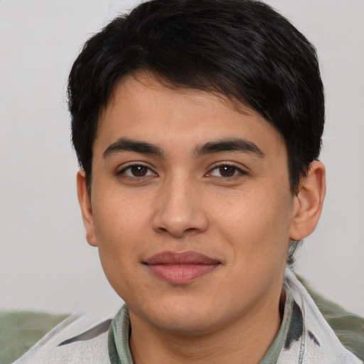 Joyful asian young-adult male with short  brown hair and brown eyes