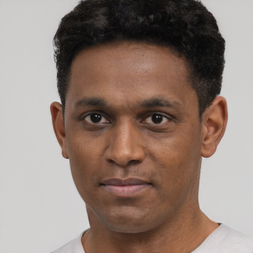 Neutral black young-adult male with short  black hair and brown eyes