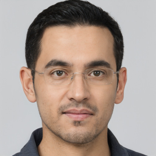 Neutral white young-adult male with short  black hair and brown eyes