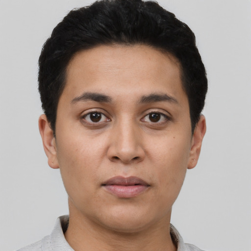 Neutral latino young-adult male with short  black hair and brown eyes