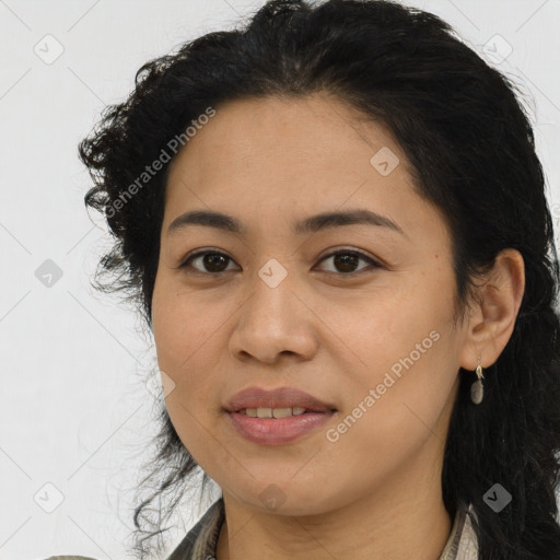 Joyful latino young-adult female with long  brown hair and brown eyes