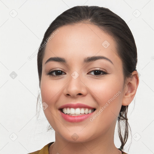 Joyful white young-adult female with long  brown hair and brown eyes