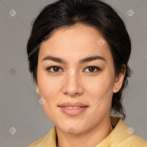 Joyful latino young-adult female with medium  brown hair and brown eyes