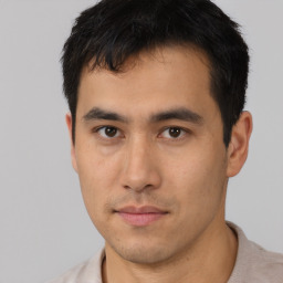 Neutral asian young-adult male with short  brown hair and brown eyes