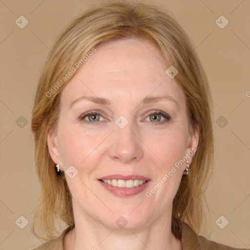 Joyful white adult female with medium  brown hair and brown eyes