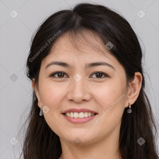 Joyful white young-adult female with long  brown hair and brown eyes