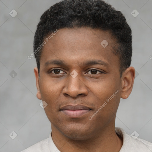 Joyful latino young-adult male with short  brown hair and brown eyes