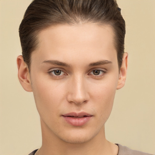 Neutral white young-adult female with short  brown hair and brown eyes