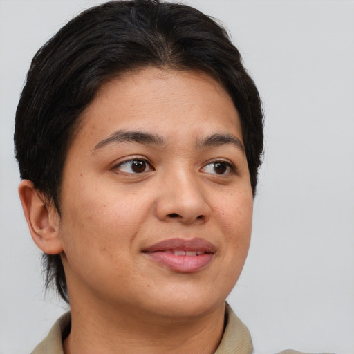 Joyful asian young-adult female with short  brown hair and brown eyes