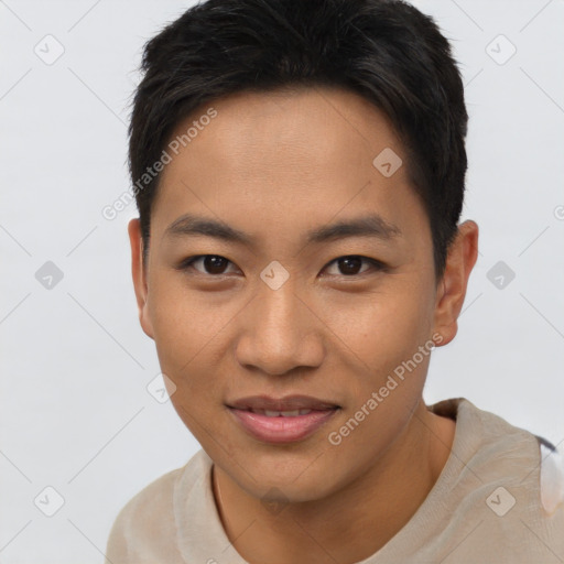 Joyful asian young-adult male with short  brown hair and brown eyes