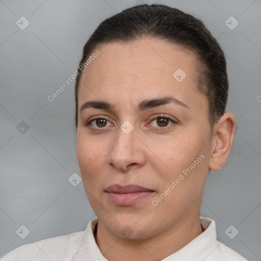 Joyful white young-adult female with short  brown hair and brown eyes