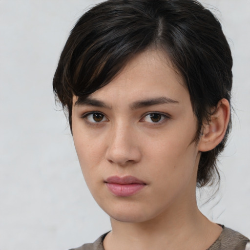Neutral asian young-adult female with medium  brown hair and brown eyes