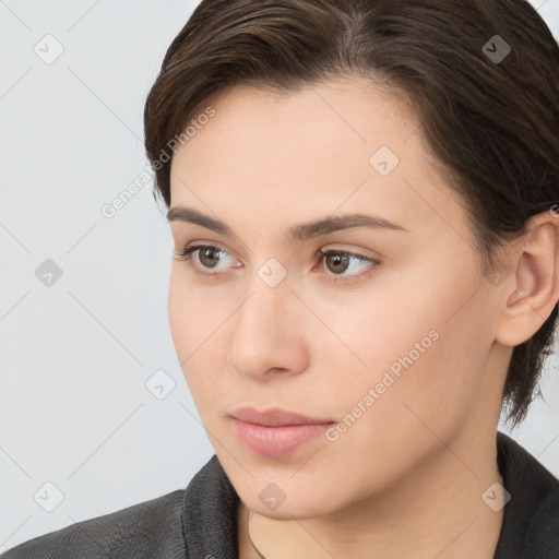 Neutral white young-adult female with medium  brown hair and brown eyes