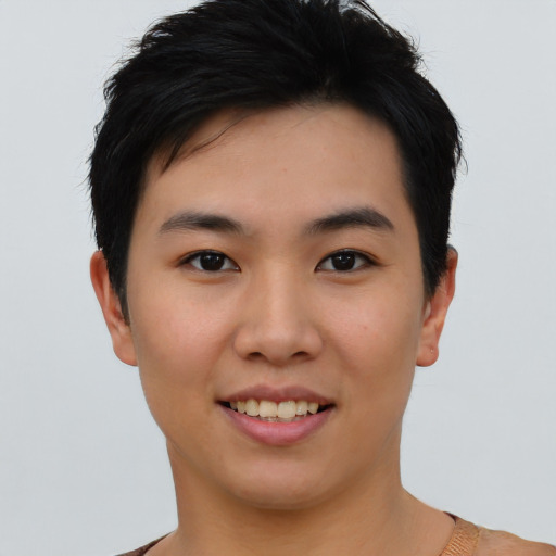 Joyful asian young-adult female with short  black hair and brown eyes