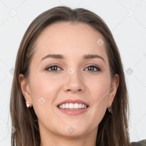 Joyful white young-adult female with long  brown hair and grey eyes