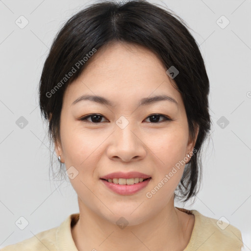 Joyful asian young-adult female with medium  brown hair and brown eyes