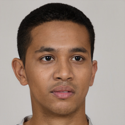 Neutral latino young-adult male with short  brown hair and brown eyes