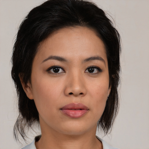 Neutral asian young-adult female with medium  brown hair and brown eyes