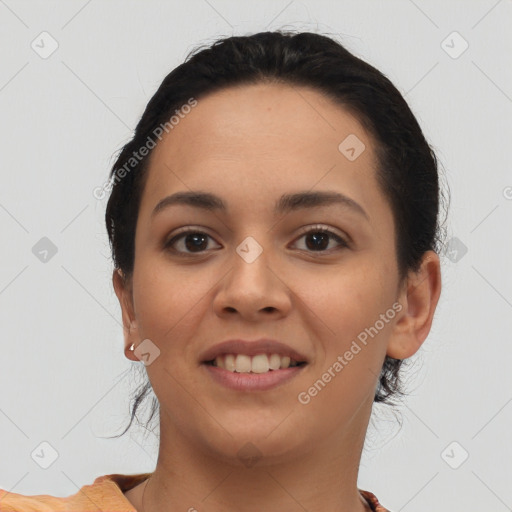 Joyful latino young-adult female with short  black hair and brown eyes