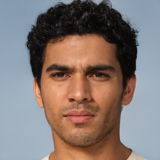 Neutral latino young-adult male with short  brown hair and brown eyes