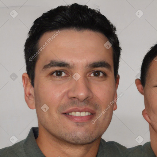 Joyful white young-adult male with short  black hair and brown eyes