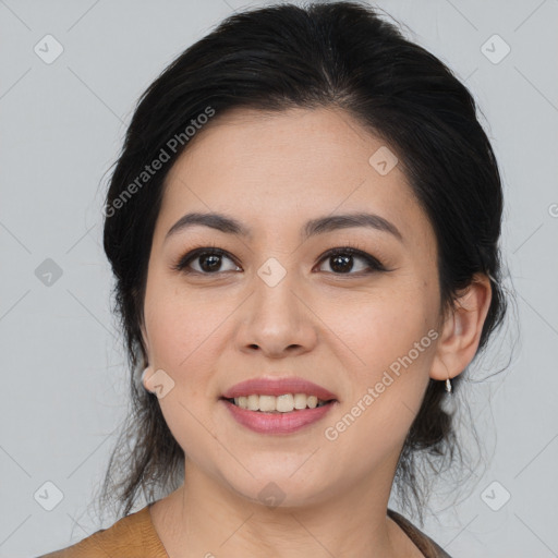 Joyful asian young-adult female with medium  black hair and brown eyes