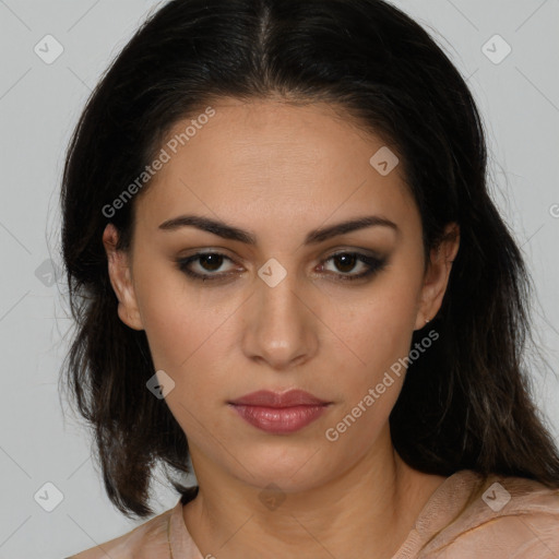 Joyful latino young-adult female with medium  brown hair and brown eyes