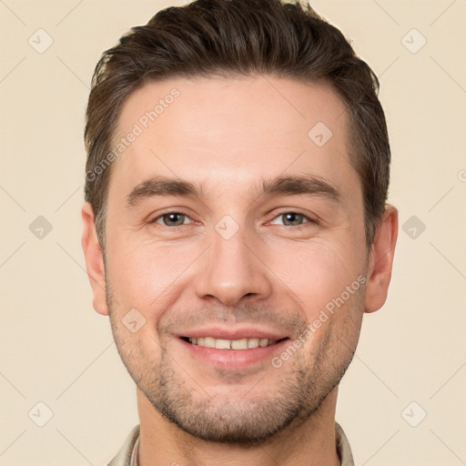 Joyful white young-adult male with short  brown hair and brown eyes