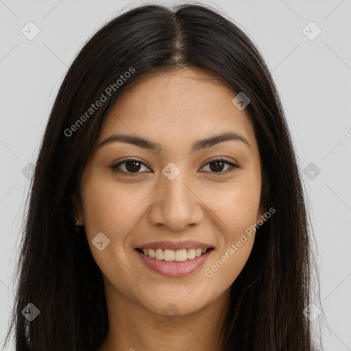 Joyful latino young-adult female with long  brown hair and brown eyes