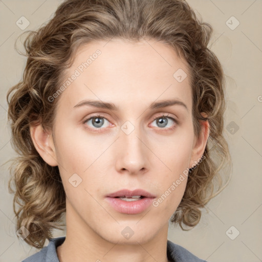 Neutral white young-adult female with medium  brown hair and blue eyes