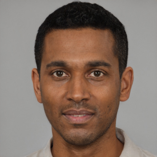Neutral black young-adult male with short  black hair and brown eyes