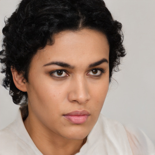 Neutral latino young-adult female with short  black hair and brown eyes