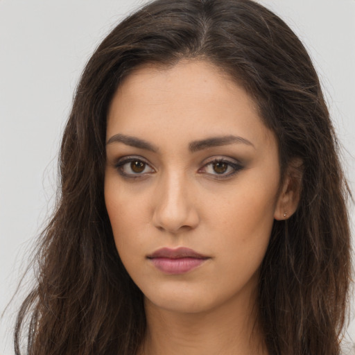 Neutral white young-adult female with long  brown hair and brown eyes