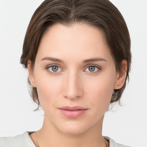 Neutral white young-adult female with medium  brown hair and grey eyes