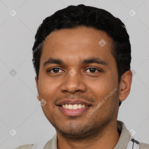 Joyful latino young-adult male with short  black hair and brown eyes