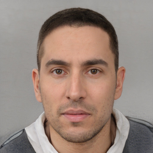 Neutral white adult male with short  brown hair and brown eyes