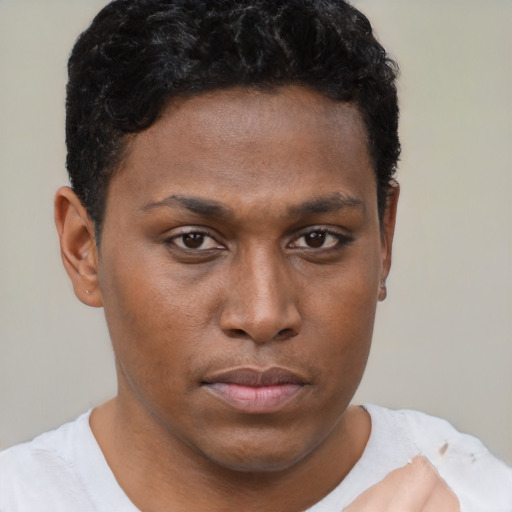 Neutral black young-adult male with short  brown hair and brown eyes