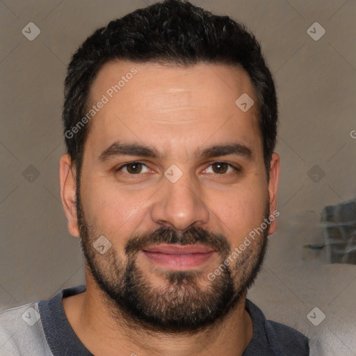 Joyful white young-adult male with short  black hair and brown eyes