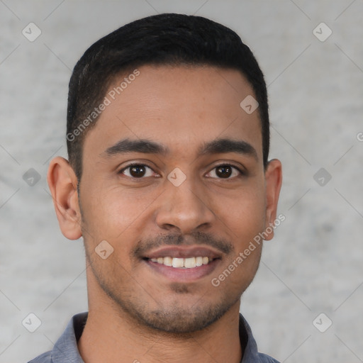 Joyful latino young-adult male with short  brown hair and brown eyes