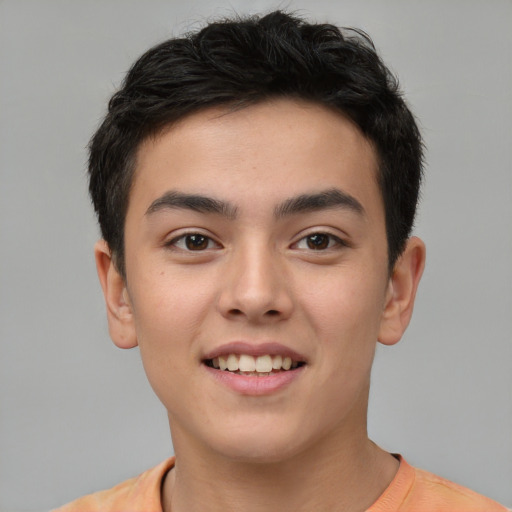 Joyful asian young-adult male with short  brown hair and brown eyes