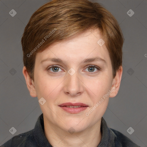 Joyful white adult female with short  brown hair and grey eyes