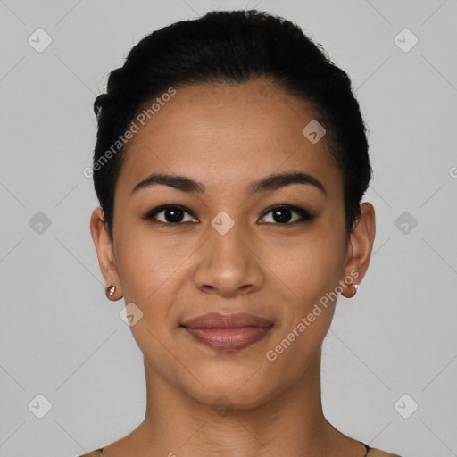 Joyful latino young-adult female with short  black hair and brown eyes