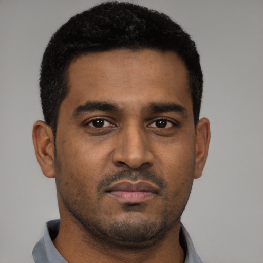 Neutral black young-adult male with short  black hair and brown eyes