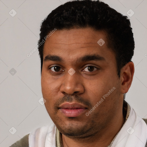 Neutral black young-adult male with short  black hair and brown eyes