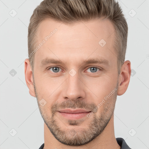 Joyful white adult male with short  brown hair and grey eyes