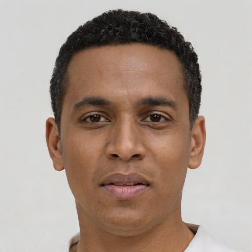 Neutral black young-adult male with short  black hair and brown eyes