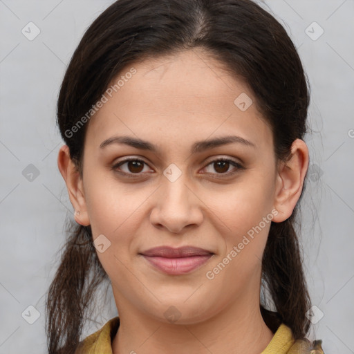 Joyful white young-adult female with medium  brown hair and brown eyes