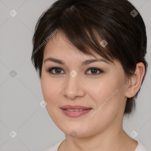 Joyful white young-adult female with medium  brown hair and brown eyes