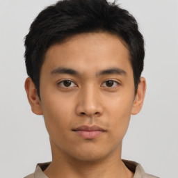 Neutral asian young-adult male with short  brown hair and brown eyes